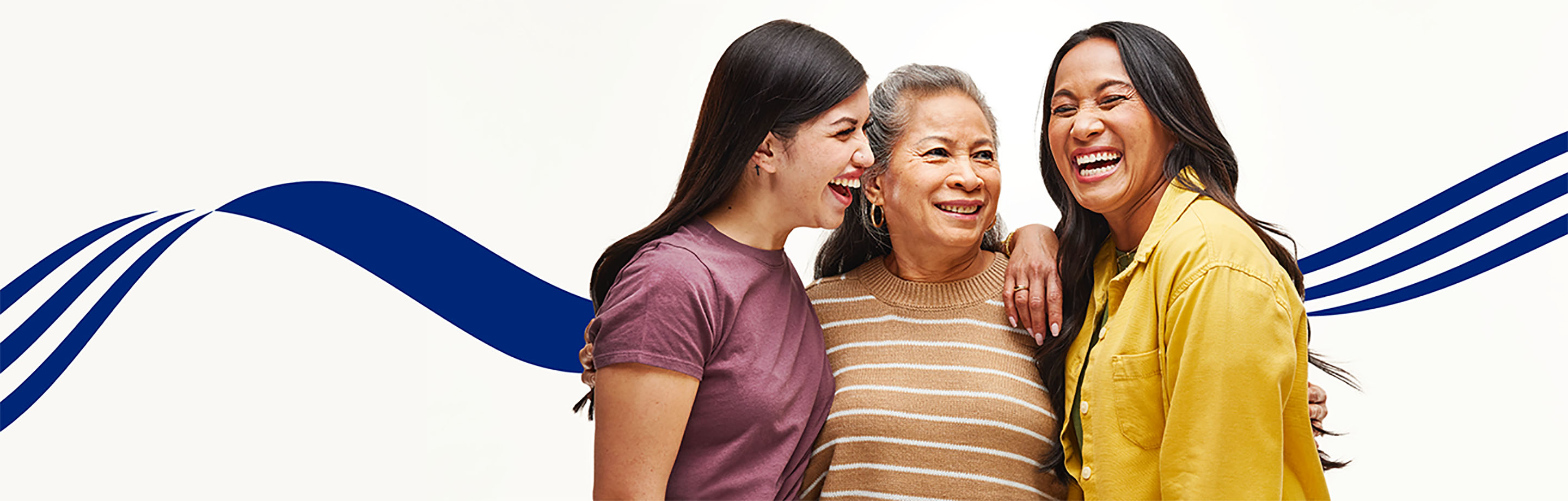 Three women hear each other laugh together - helping illustrate the UnitedHealthcare commitment to meeting patients' hearing health care needs