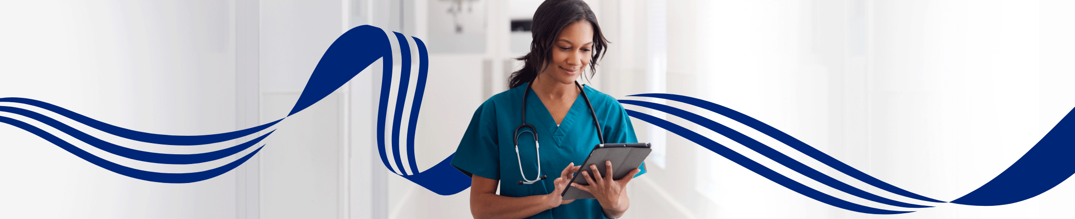 Health care provider reviewing information on a tablet
